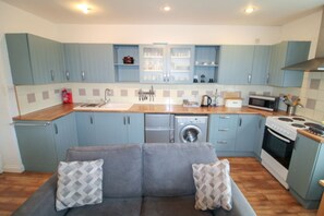 Fridge, microwave, oven, cookware/dishes/utensils