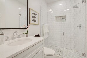 Shower, hair dryer, soap, shampoo