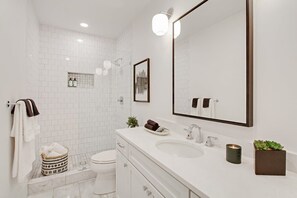 Shower, hair dryer, soap, shampoo