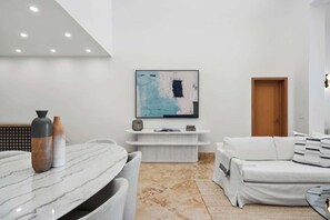 Each seating area has a credenza – nestled beneath impressive pieces of wall-art - Villa Ocean Dreams @ Cottages Dorado beach (Dorado)
