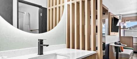 Combined shower/tub, hair dryer, towels, soap