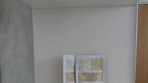 A bathroom shelf with two shower shampoo bottles and a few sachets. - Charming bed & breakfast with 9 bedrooms and WiFi, AC in enchanting Međugorje (Međugorje)