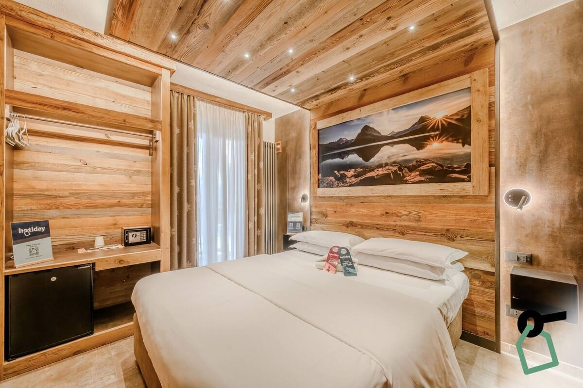 Habitación doble | Minibar, caja fuerte, wifi gratis y ropa de cama