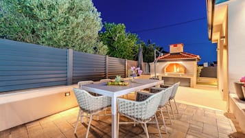 Deluxe Villa, Garden View | Terrace/patio