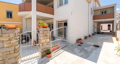 Maison d'hÎtes 'Grazia Deledda' avec terrasse partagée, Wi-Fi et climatisation