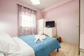 1 bedroom, desk, iron/ironing board, travel cot