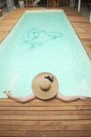 Outdoor pool, open 9:00 AM to 10:30 AM, pool loungers