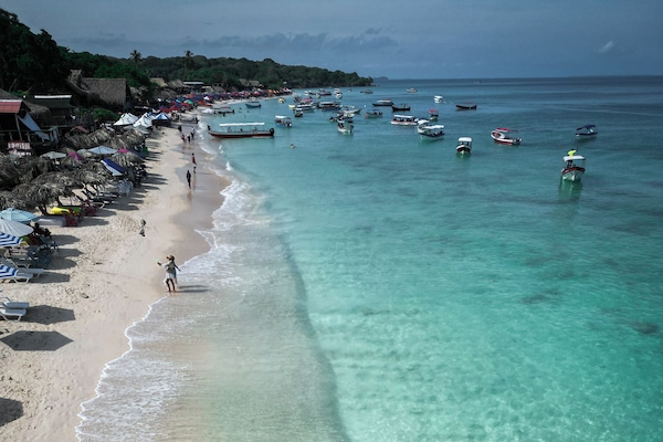 On the beach, white sand, beach shuttle, beach cabanas
