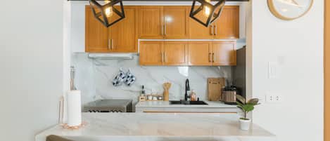 Oven, stovetop, cookware/dishes/utensils, dining tables