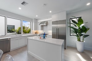 Fridge, microwave, oven, stovetop - Bleuphoria! Rooftop Views and Poolside Fun! (Anna Maria)