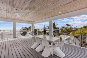 Outdoor dining - Bleuphoria! Rooftop Views and Poolside Fun! (Anna Maria)