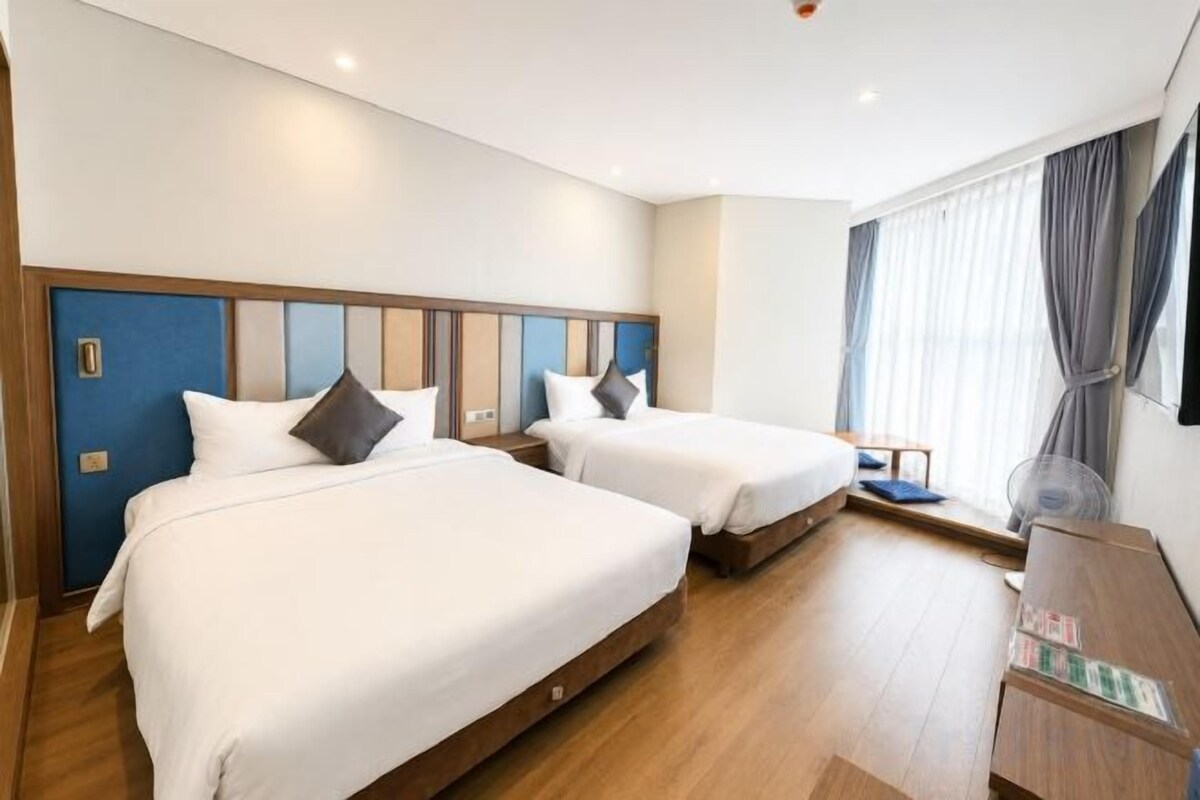 Memory-foam beds, desk, laptop workspace, blackout curtains