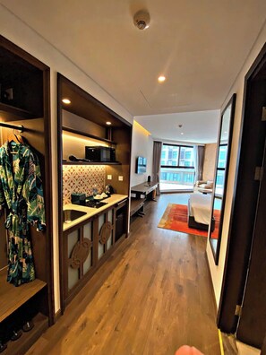 Studio, 2 Twin Beds | Private kitchen | Mini-fridge, microwave, stovetop, eco-friendly cleaning products - Apec Mandala Cham Bay Condotel Mui Ne (Phan Thiet)