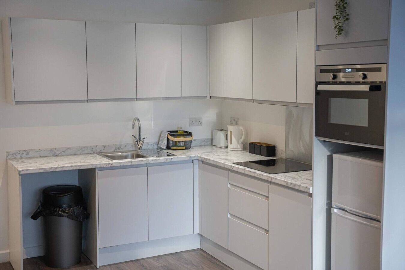 Fridge, microwave, toaster, cookware/dishes/utensils