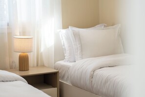 2 chambres, fer et planche à repasser, Wi-Fi, draps fournis