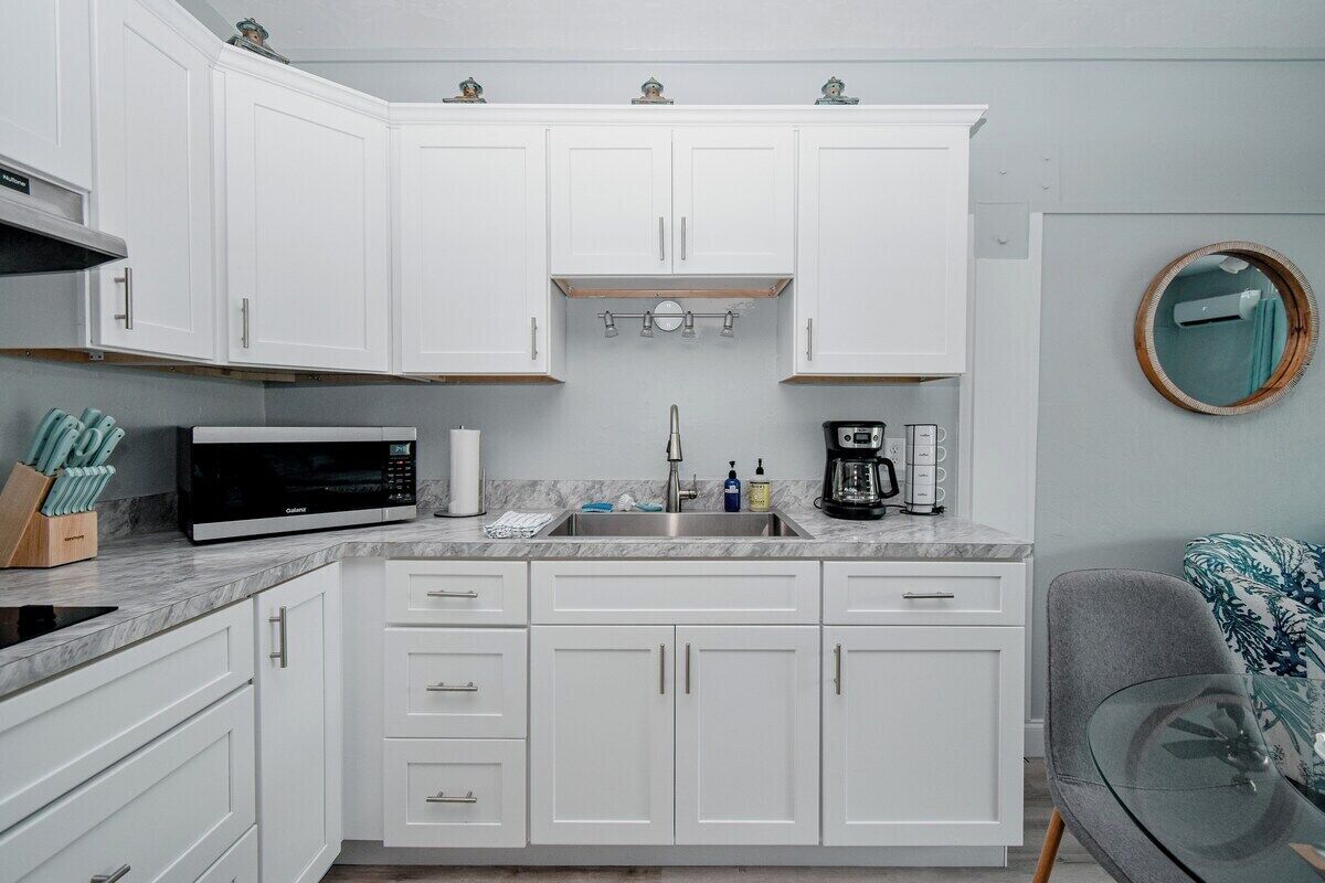 Fridge, microwave, coffee/tea maker, toaster