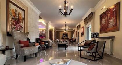 AcAssia : Relax and Unwind in Comfort at This Spacious Family Villa