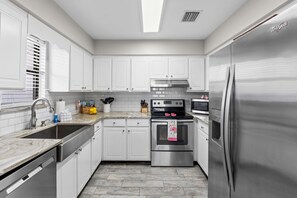 Family Townhome, Pool View | Private kitchen