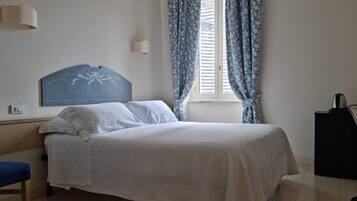 Dobbelt- eller tomannsrom – comfort | Dundyner, minibar, individuelt innredet og skrivebord