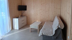 Living room - 2 Bedroom Holiday Home With air Conditioning (Postomino)