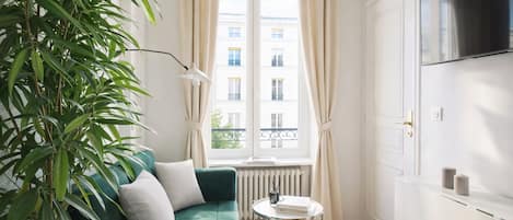 Basic Apartment, Courtyard View | Living area | 80-cm Smart TV with digital channels
