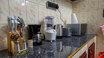 Townhome | Private kitchen | Coffee/tea maker, electric kettle