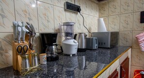 Townhome | Private kitchen | Coffee/tea maker, electric kettle