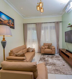 Townhome | Living area | 55-inch LED TV with digital channels, Netflix, pay movies