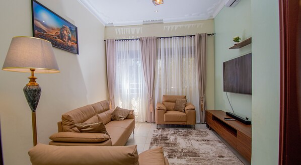 55-inch LED TV with digital channels, Netflix, pay movies - Urban Oasis (Kampala)