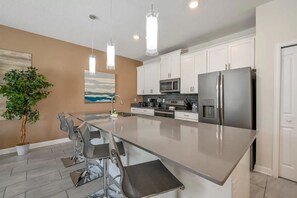 Fridge, microwave, oven, dishwasher - Stylish 4BR Townhome w/ Pool near Disney (Kissimmee)