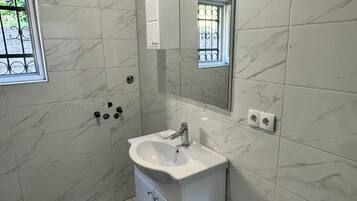 Hair dryer, towels, soap, toilet paper