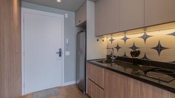 Fridge, microwave, stovetop, coffee/tea maker