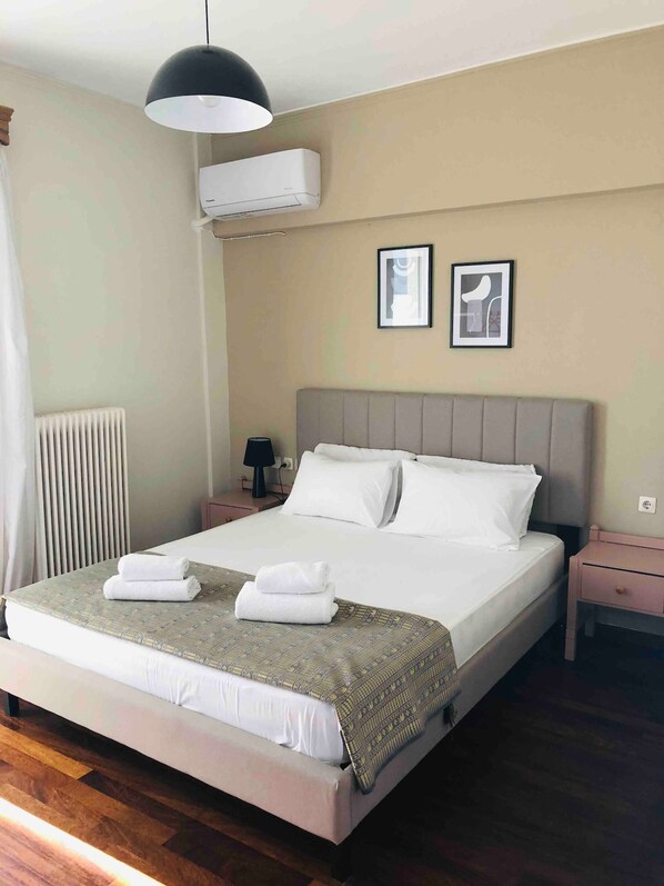 1 bedroom, desk, iron/ironing board, travel crib