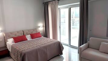 1 bedroom, desk, iron/ironing board, travel crib