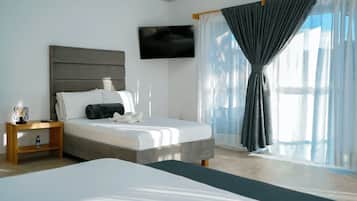 Chambre Triple Familiale, vue lagon | Wi-Fi gratuit, draps fournis