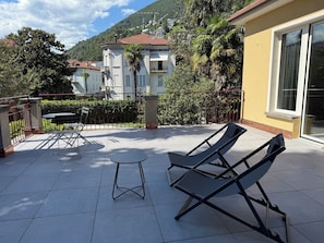 Appartement Deluxe, vue jardin | Terrasse/Patio