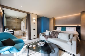 Junior Suite, Balcony, Mountain View | Living area | TV