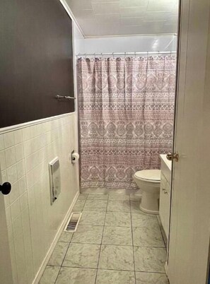 Hair dryer, towels, soap, toilet paper