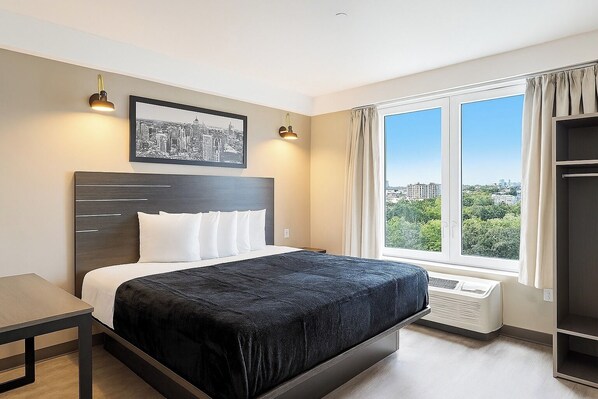 Deluxe kamer, 1 kingsize bed | Een bureau, een laptopwerkplek, gratis wifi, beddengoed