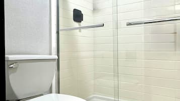 Rainfall showerhead, hair dryer, towels, soap