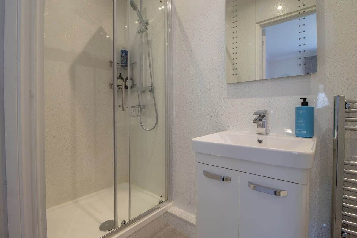 Shower, hair dryer, shampoo