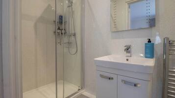 Shower, hair dryer, shampoo