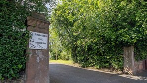 A sign for Braeside Gardens at 93-113 Hamilton Road. - The Well - 3 bedroom apartment (Motherwell)