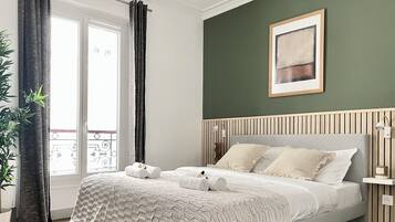 Family Apartment, Courtyard View | Iron/ironing board, travel crib, free WiFi, bed sheets