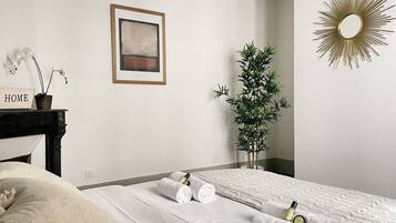 Family Apartment, Courtyard View | Iron/ironing board, travel crib, free WiFi, bed sheets