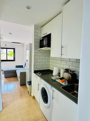 Fridge, microwave, stovetop, electric kettle