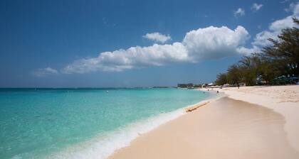 Tranquil Villa with Ocean Views, Only Steps Away From Seven Mile Beach!