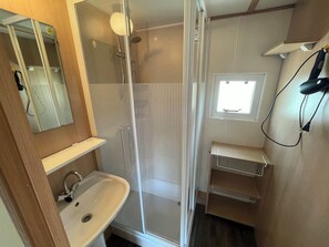 Shower, hair dryer, toilet paper