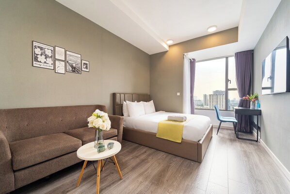 Studio Familial, 1 grand lit et 1 canapé-lit, vue fleuve | Coin séjour