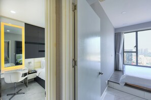 Deluxe Apartment, 2 Bedrooms, Balcony, River View | Minibar, desk, laptop workspace, blackout drapes